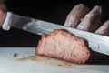 hump steak being sliced Ã¢â¬â¹Ã¢â¬â¹with copy space Royalty Free Stock Photo